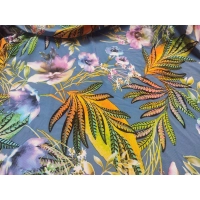 Elastyczna dzianina z wzorem pomarańczowych paproci